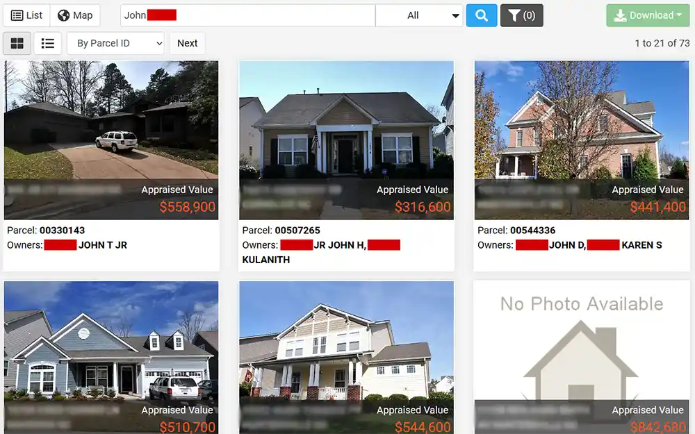 A screenshot from the Spatialest website for Mecklenburg County property records search that displays a search bar at the top and below it, are search results that includes information such as parcel number, owner name, and an image of the property.